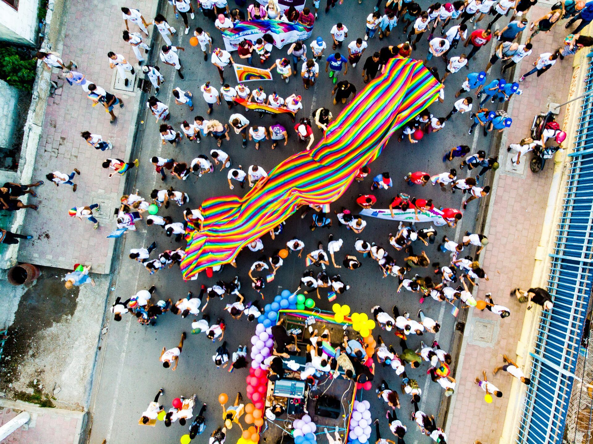 People protesting on the street for LGBTIQ+ rights. Photo by Tanushree Rao on Unsplash.