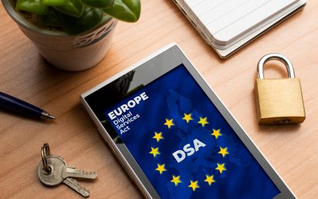 Digital Services Act (DSA) concept. Smartphone with the european map and flag with the text: DSA Digital Services Act