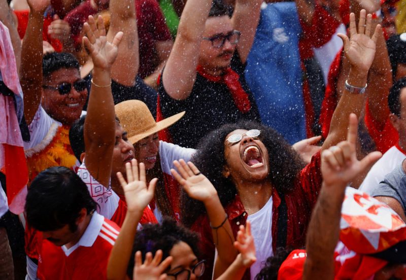 Supporters of Brazil's President elect Luiz Inacio Lula da Silva gather outside the Planalto Palace ahead of Lula's swear-in ceremony, in Brasilia, Brazil, January 1, 2023. REUTERS/Adriano Machado